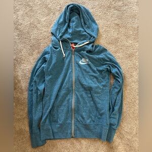 Blue Nike zip up.  Size M